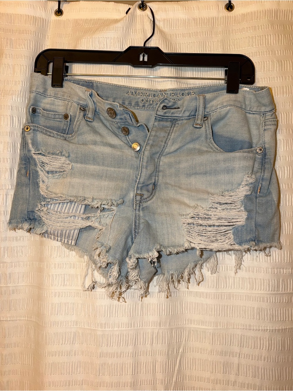 American Eagle Outfitters Light Blue Ripped Denim Cutoff Shorts